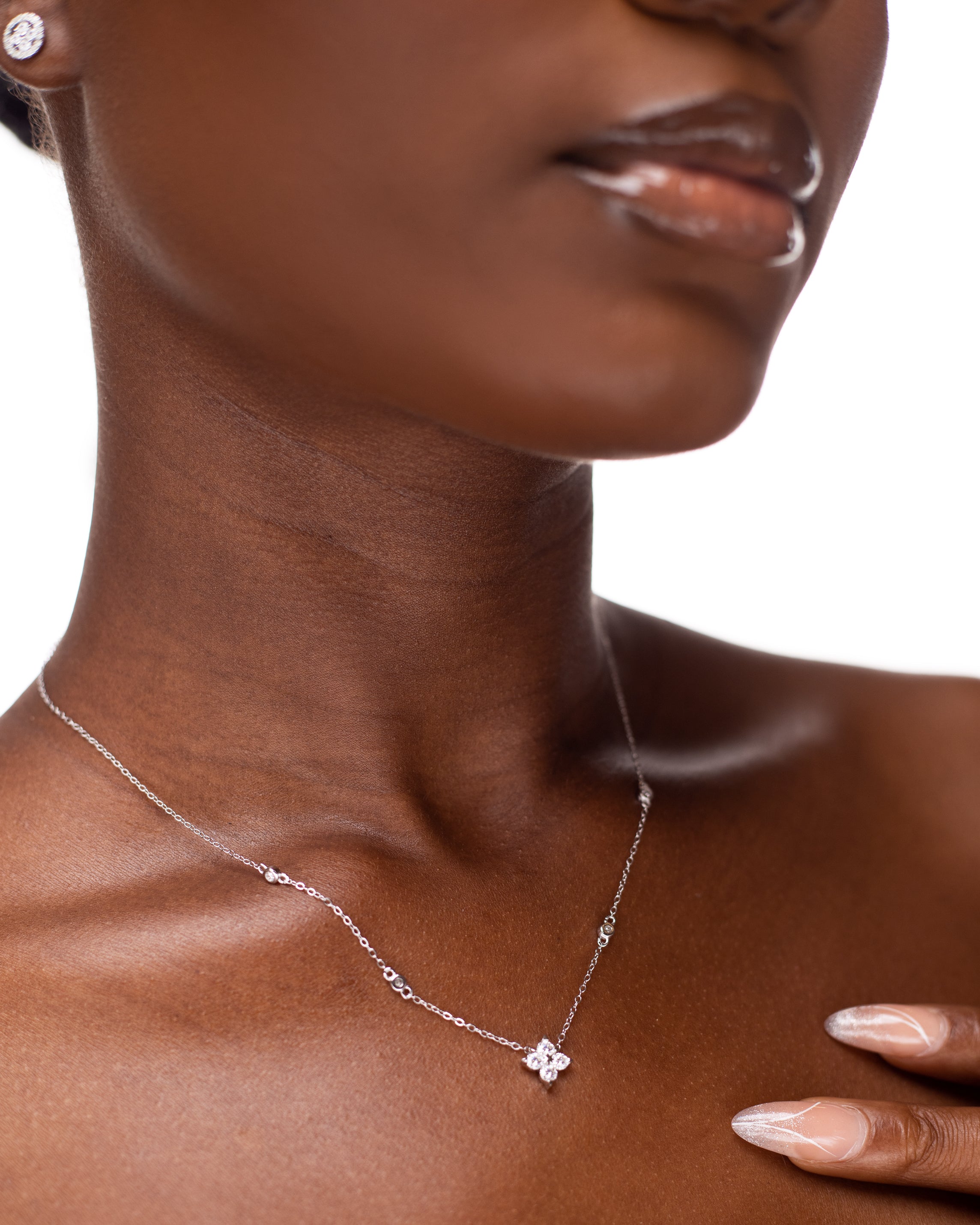 Four stone moissanaite necklace with stoned chain